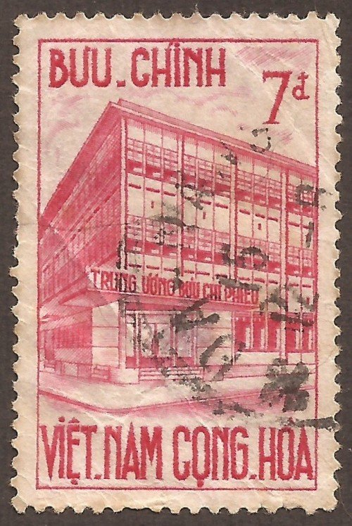 Stanley Gibbons #:	S172
Series:	Inauguration of postal checking service
Description:	Postal check center, Saigon
Face Value:	7 Piaster’s {đồngs}